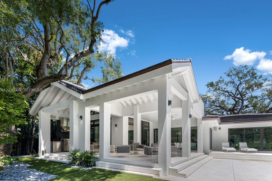 Exterior details and patio area of a home in , Coral Gables (Image 22).