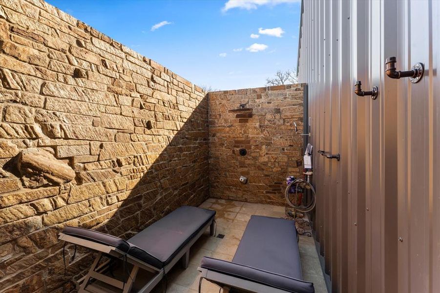 outdoor shower off the primary bedroom