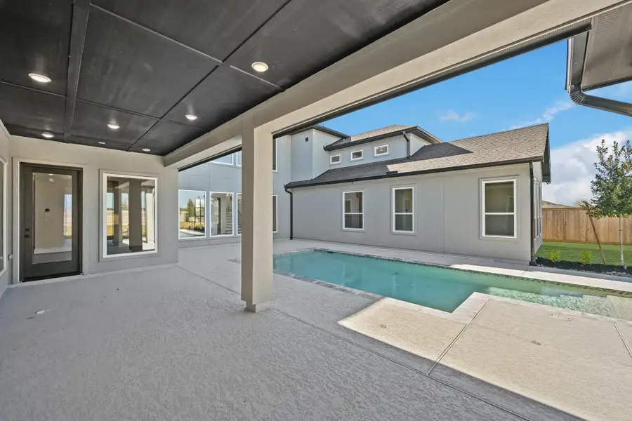 Exterior details and patio area of a home in Bridgeland, Cypress (Image 2).