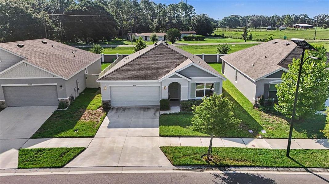 Front exterior of a new home in Mirada, San Antonio, FL, highlighting curb appeal (Image 24). Front exterior of a new home in Mirada, San Antonio, FL, highlighting curb appeal (Image 24).