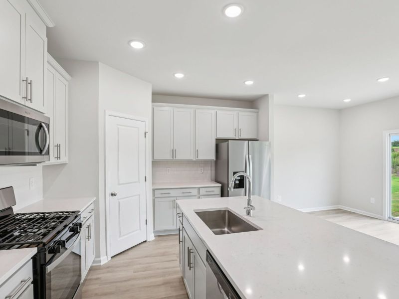 Furnished interior view inside a new home in River Glen, Angier (Image 4).