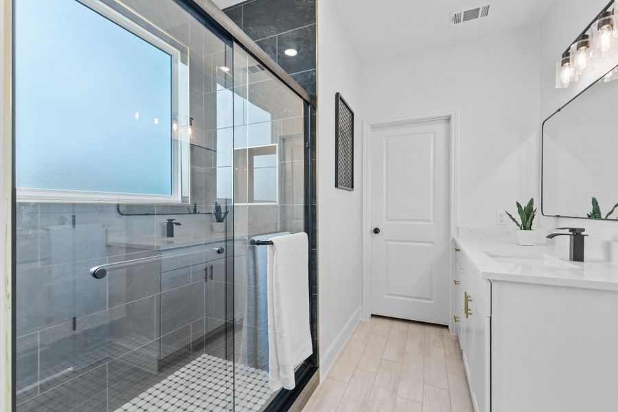 Furnished interior view inside a new home in , McDade (Image 10).