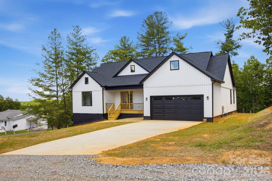 Front exterior of a new home in , Morganton, NC, highlighting curb appeal (Image 20).