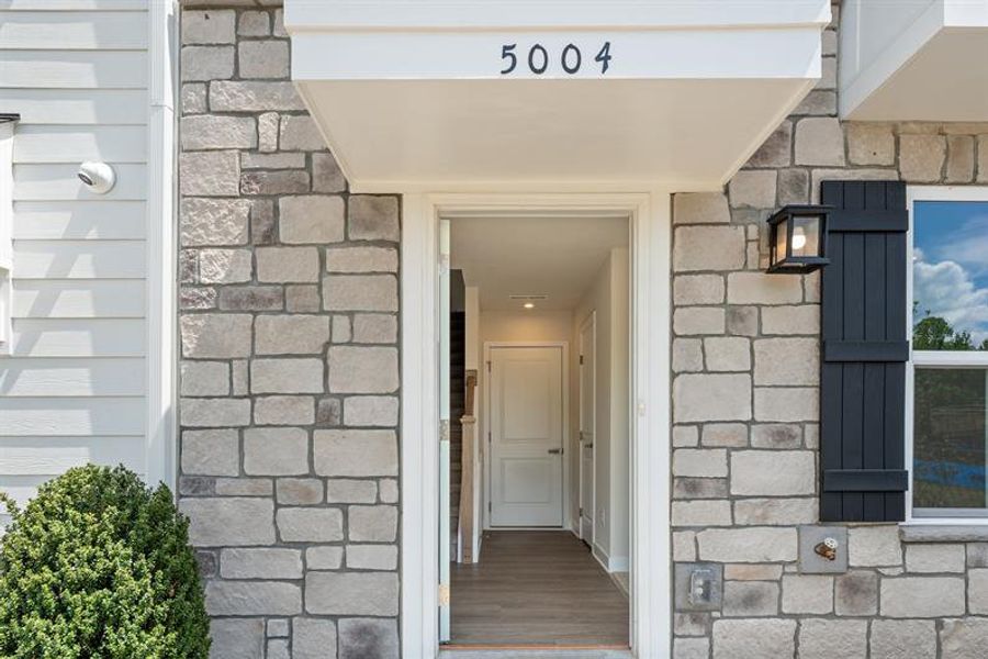 Exterior details and patio area of a home in Stowe Branch Townhomes, Charlotte (Image 3).