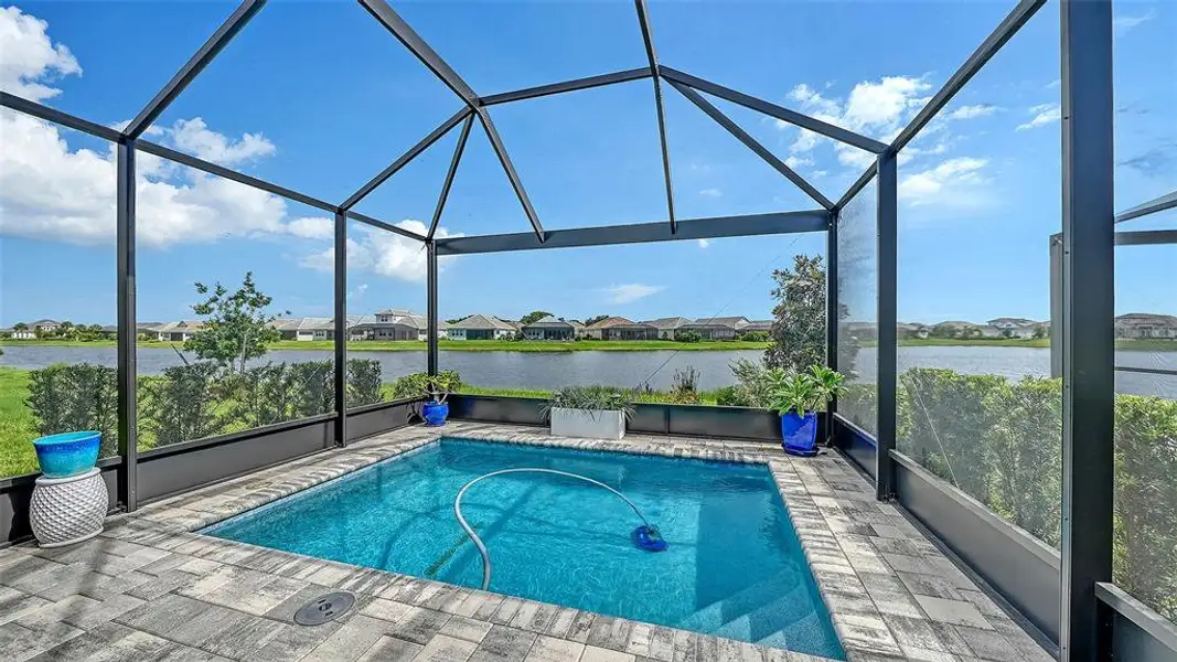 Exterior details and patio area of a home in LakeHouse Cove at Waterside, Sarasota (Image 22). Exterior details and patio area of a home in LakeHouse Cove at Waterside, Sarasota (Image 22).