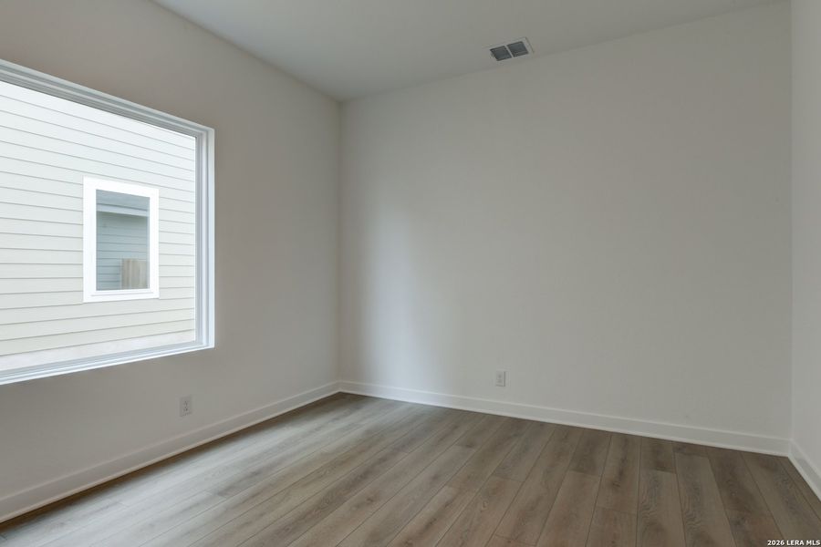 Spacious, unfurnished interior of a new home in The Wilder, Adkins (Image 19).
