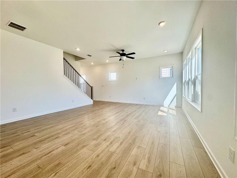 Spacious, unfurnished interior of a new home in Eastlyn Crossing, Flowery Branch (Image 13).