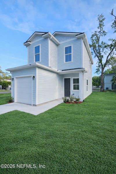 Front exterior of a new home in , Jacksonville, FL, highlighting curb appeal (Image 19).