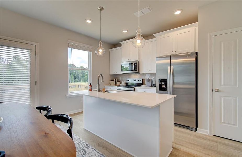 Furnished interior view inside a new home in Enclave at Evergreen, Fairburn (Image 9).