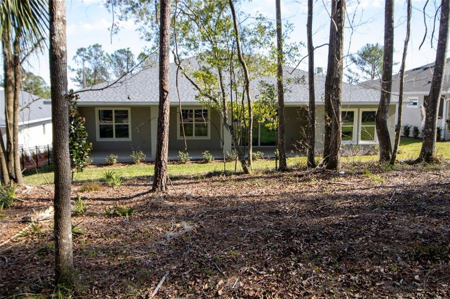 Exterior details and patio area of a home in , Brooksville (Image 33).
