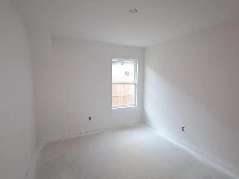 Spacious, unfurnished interior of a new home in Sorella, Tomball (Image 9).