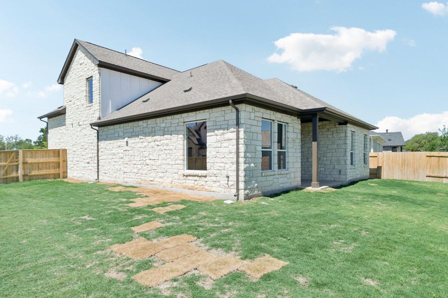 Exterior details and patio area of a home in Persimmon, Buda (Image 22).
