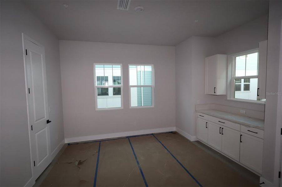 In-progress construction of a new home in Towns at Union, St. Petersburg, FL (Image 6).