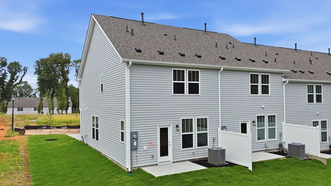 Highly functional and private backyard adds memorable living space to this elegant home near Anderson University