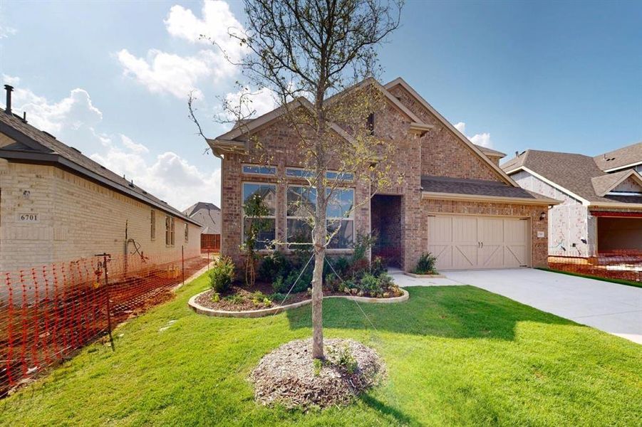 Front exterior of a new home in Aster Park, McKinney, TX, highlighting curb appeal (Image 21).