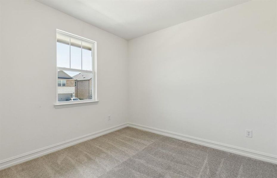 Secondary bedroom designed with generous storage solutions *Real home pictured