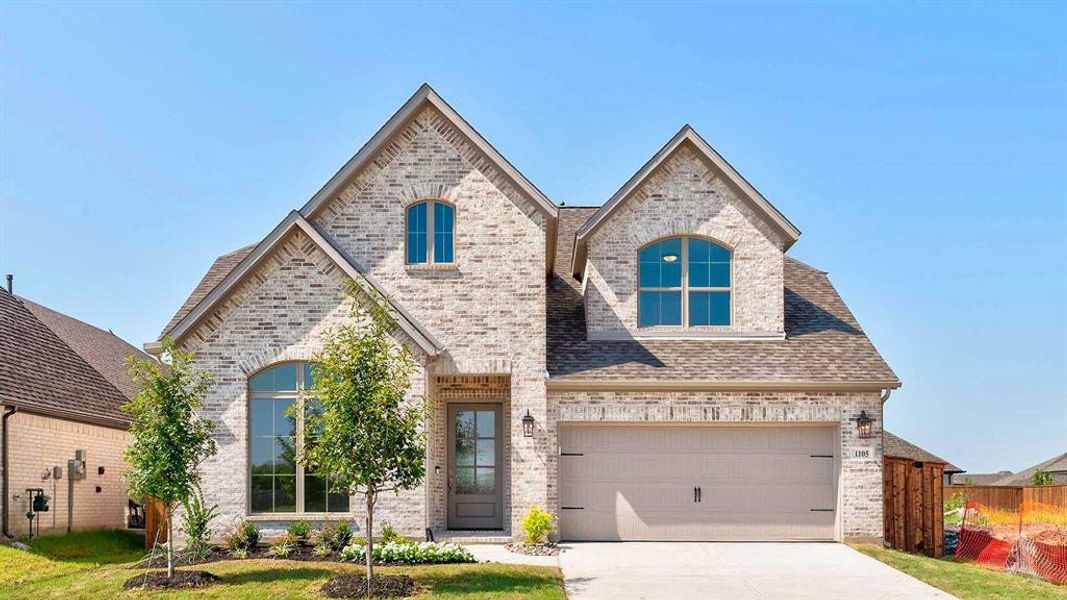 Front exterior of a new home in Devonshire - Reserve 50', Forney, TX, highlighting curb appeal (Image 2). Front exterior of a new home in Devonshire - Reserve 50', Forney, TX, highlighting curb appeal (Image 2).