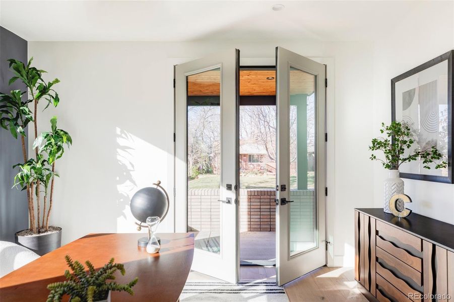 Office opens to patio for fresh air and sunlight