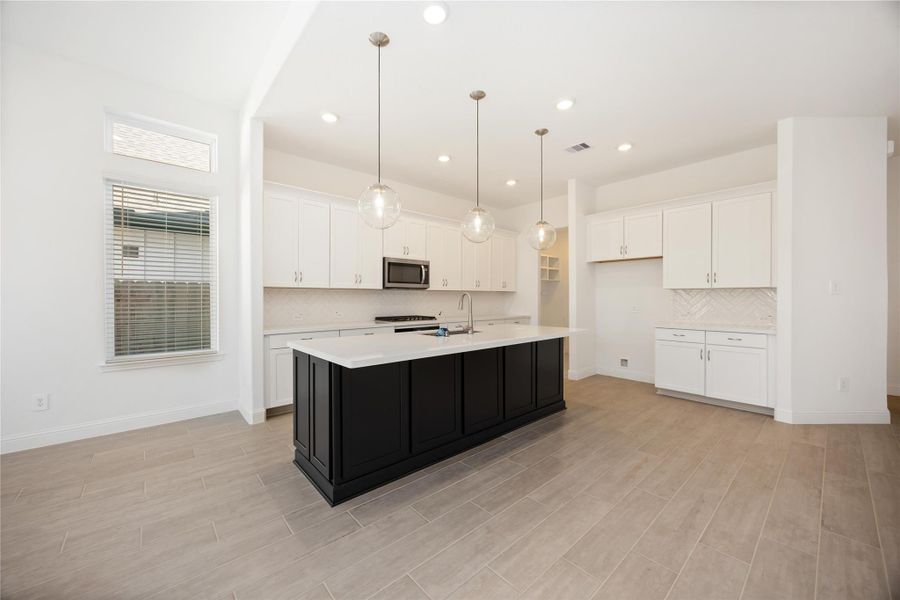 Furnished interior view inside a new home in Sienna, Missouri City (Image 5). Furnished interior view inside a new home in Sienna, Missouri City (Image 5).