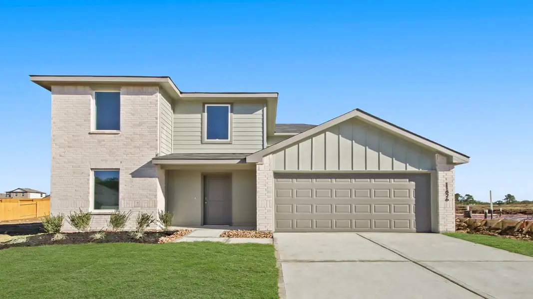 Front exterior of a new home in Lexington Heights, Willis, TX, highlighting curb appeal (Image 1).
