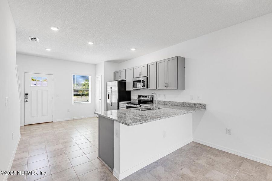 Furnished interior view inside a new home in Sabal Terrace, Jacksonville (Image 8). Furnished interior view inside a new home in Sabal Terrace, Jacksonville (Image 8).