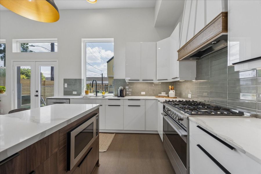 Designed for everyday living, the kitchen offers generous prep space, abundant storage, and premium stainless steel appliances. Designed for everyday living, the kitchen offers generous prep space, abundant storage, and premium stainless steel appliances.