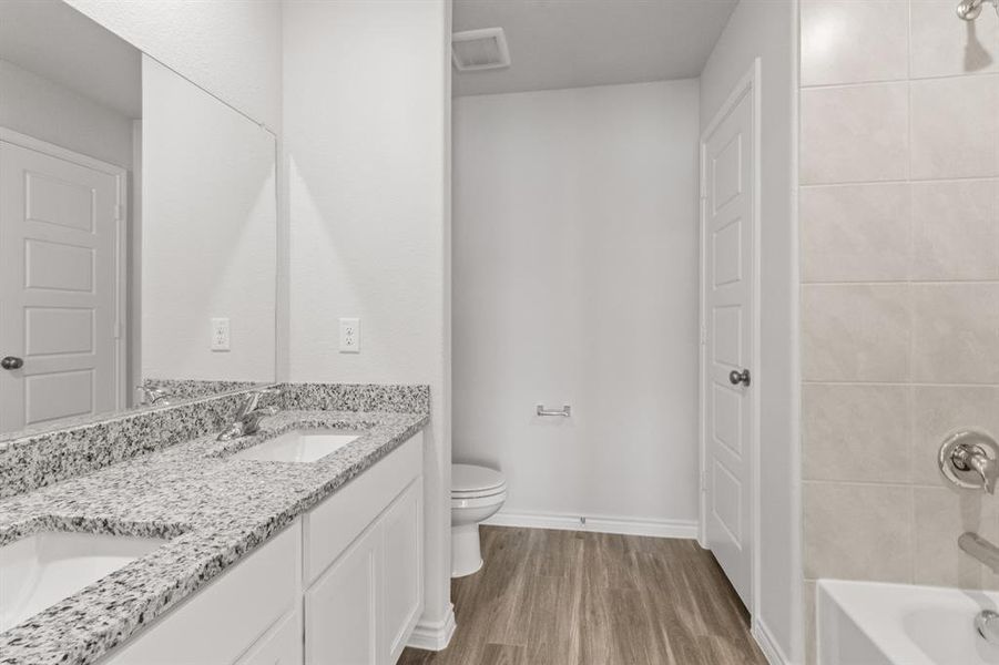 Furnished interior view inside a new home in Retreat at Fossil Creek, Fort Worth (Image 6).