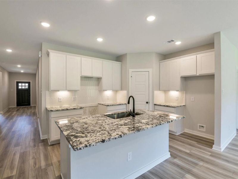 Furnished interior view inside a new home in Sundance Cove, Crosby (Image 7).