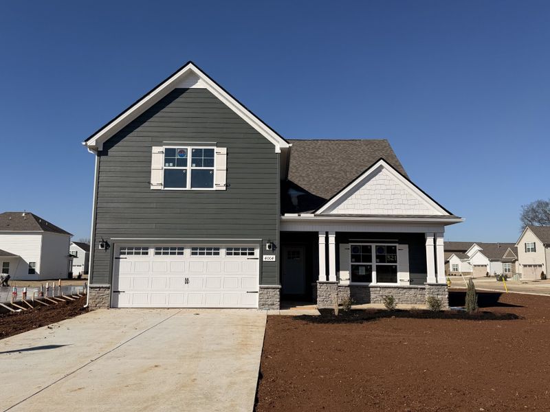 Front exterior of a new home in Salem Landing, Rockvale, TN, highlighting curb appeal (Image 1). Front exterior of a new home in Salem Landing, Rockvale, TN, highlighting curb appeal (Image 1).