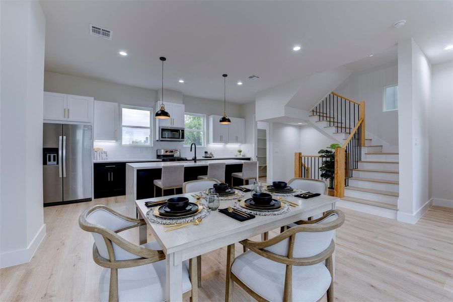 Open concept kitchen/dining/ living areas Open concept kitchen/dining/ living areas