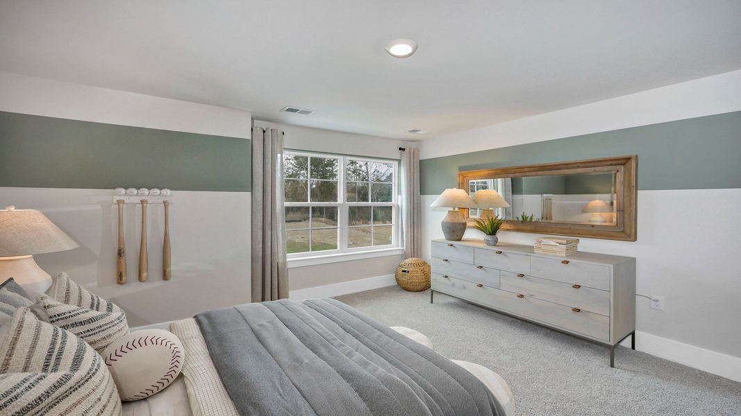 Representative furnished interior of a home built from the Harbor Oak by D.R. Horton in Lake Tide Summit, Chapin (Image 55).