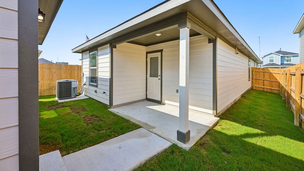 Exterior details and patio area of a home in Valverde, Bastrop (Image 21).