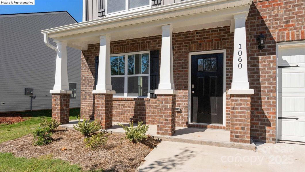 Front exterior of a new home in Secrest Commons, Monroe, NC, highlighting curb appeal (Image 14).