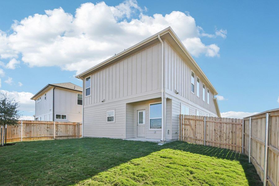 Exterior details and patio area of a home in Porter Country, Buda (Image 18).
