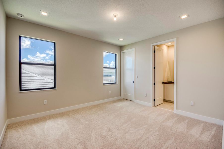Furnished interior view inside a new home in Apex at Avenir, Palm Beach Gardens (Image 44).