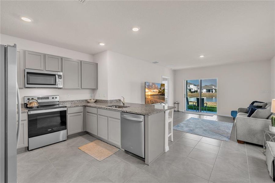 Furnished interior view inside a new home in Star Farms at Lakewood Ranch, Bradenton (Image 14).