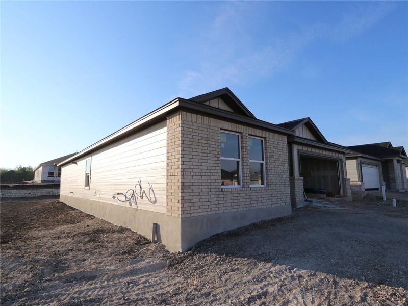 Exterior details and patio area of a home in Marble Creek Crossing, Austin (Image 2).