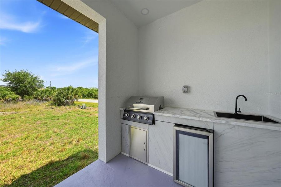Exterior details and patio area of a home in , Port Charlotte (Image 28).