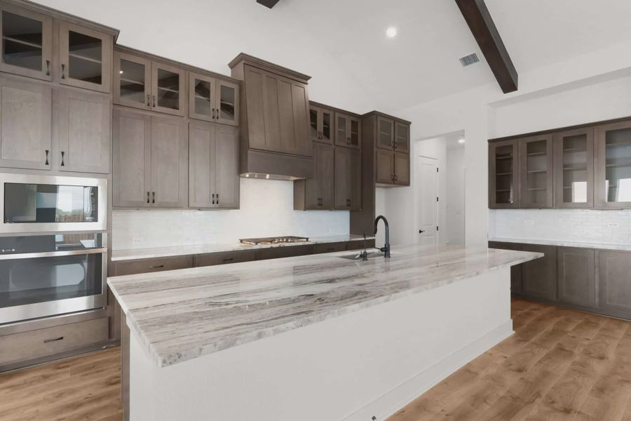 Representative furnished interior of a home built from the Drios by Chesmar Homes in Berry Creek Highlands, Georgetown (Image 5).