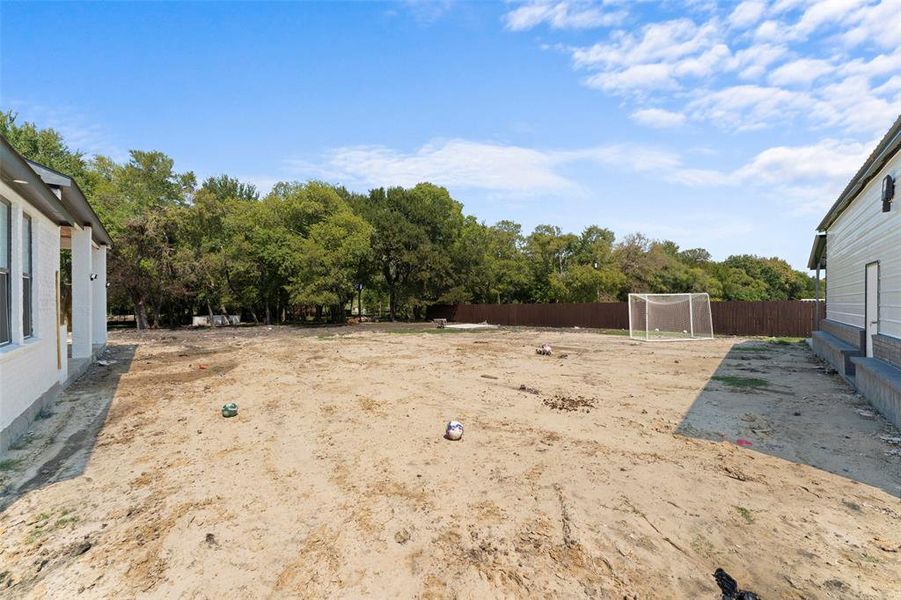 View of yard with a sport area View of yard with a sport area
