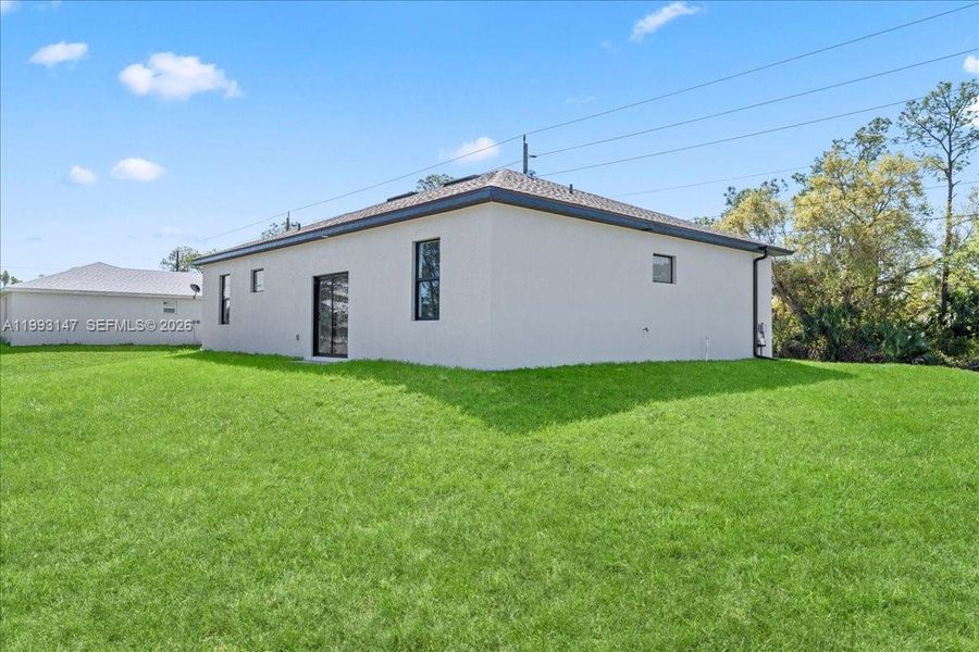 Exterior details and patio area of a home in , Lehigh Acres (Image 12).