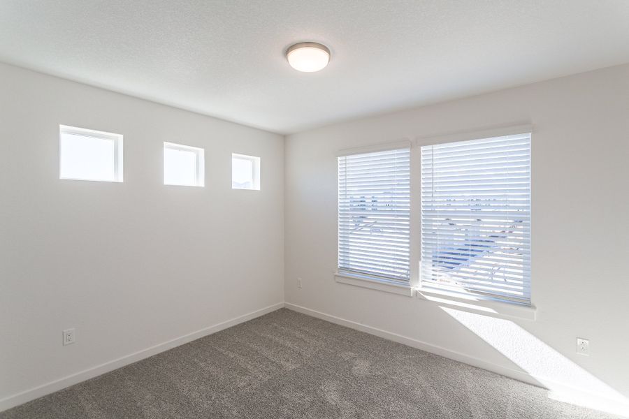 Representative unfurnished interior of a home built from the Conrad by Lokal Homes in The Vistas at West Mesa, Colorado Springs (Image 10).
