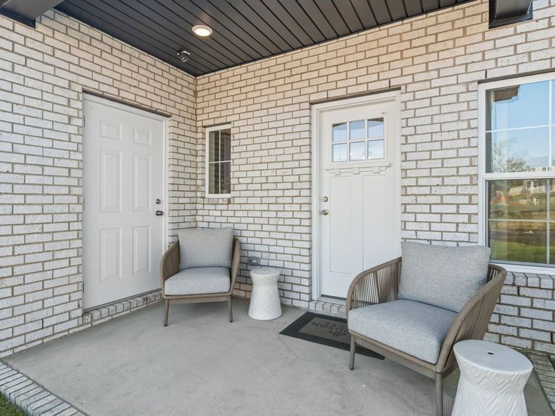 Exterior details and patio area of a home in The Towns at Red River, Gallatin (Image 25). Exterior details and patio area of a home in The Towns at Red River, Gallatin (Image 25).