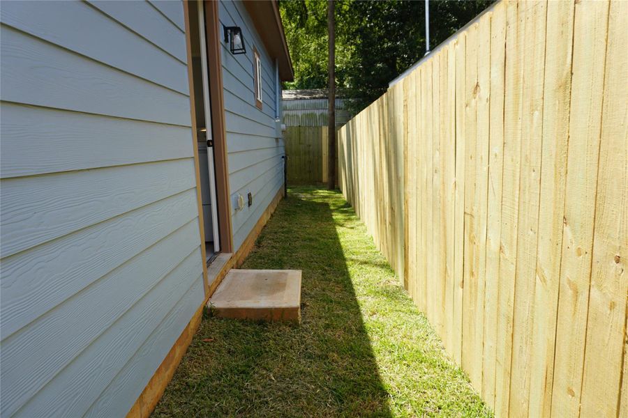 Exterior details and patio area of a home in , Willis (Image 2). Exterior details and patio area of a home in , Willis (Image 2).