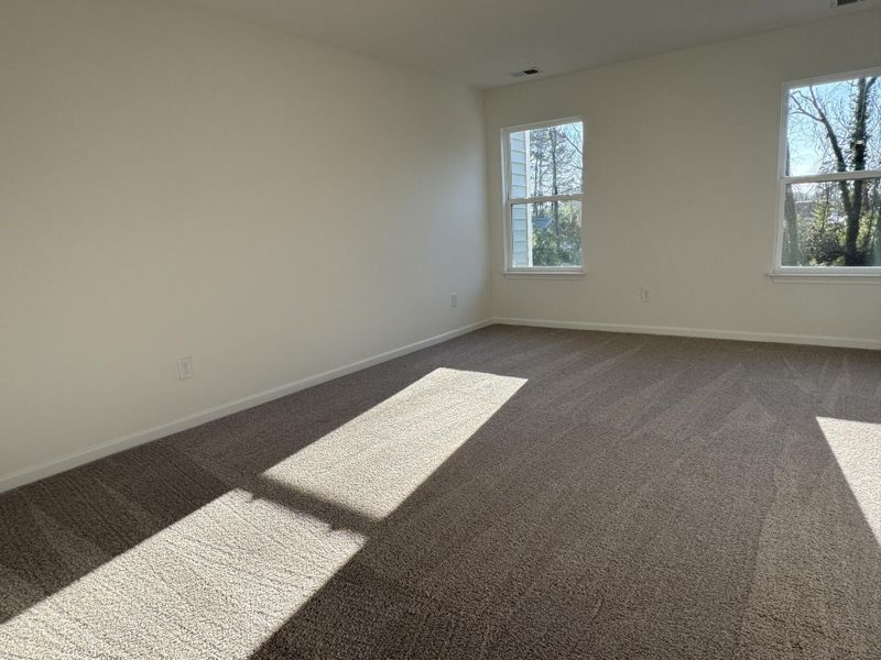 Spacious, unfurnished interior of a new home in East Main Townes, Spartanburg (Image 16).