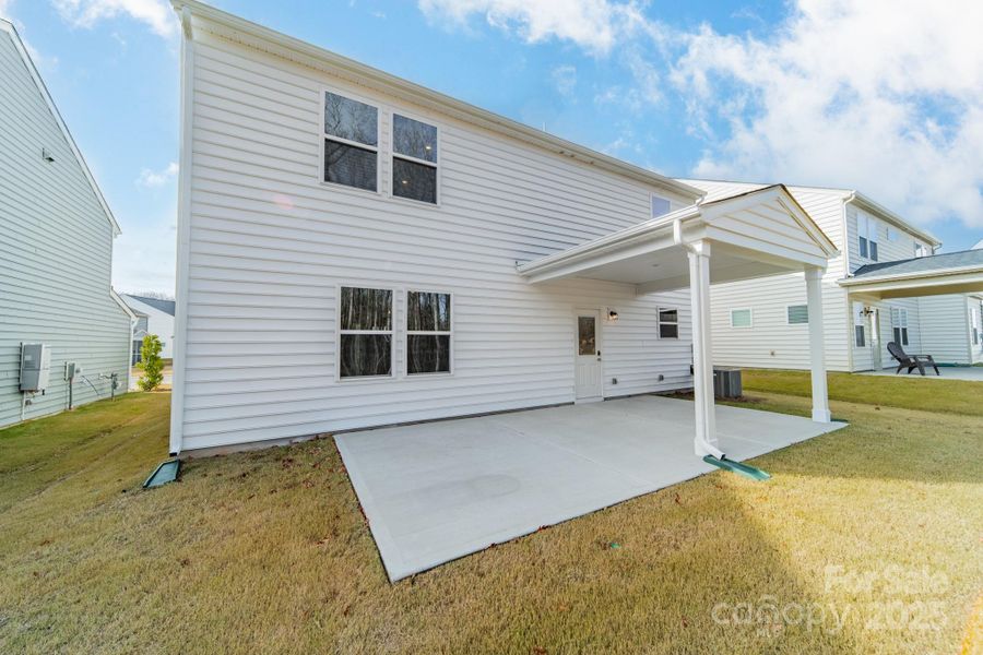 Exterior details and patio area of a home in Stewarts Landing, Charlotte (Image 23).