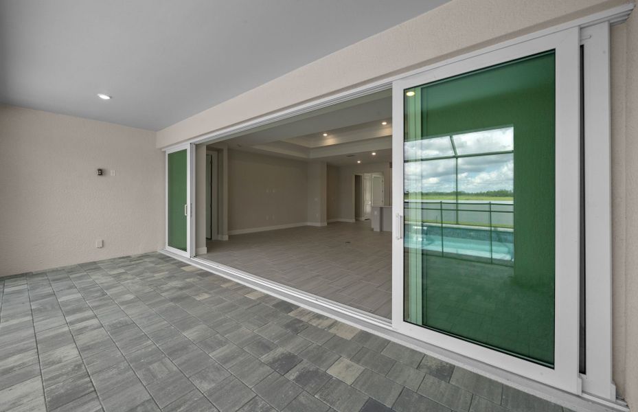 Exterior details and patio area of a home in Del Webb Oak Creek, North Fort Myers (Image 17).