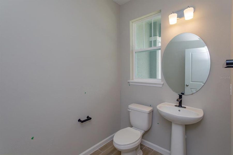 Furnished interior view inside a new home in Serenade at Ovation, Winter Garden (Image 9).