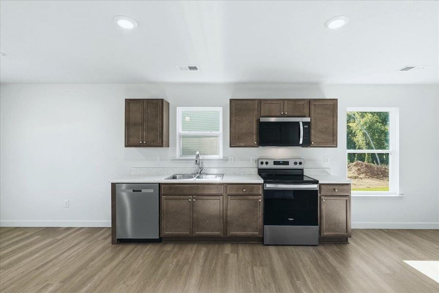 Furnished interior view inside a new home in Stones Throw, Inman (Image 7).
