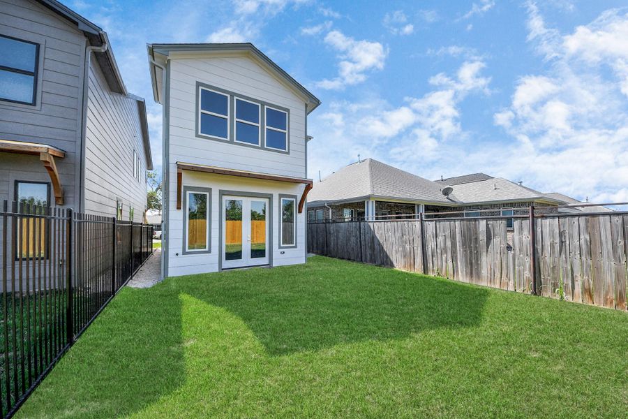 Exterior details and patio area of a home in , Houston (Image 4). Exterior details and patio area of a home in , Houston (Image 4).